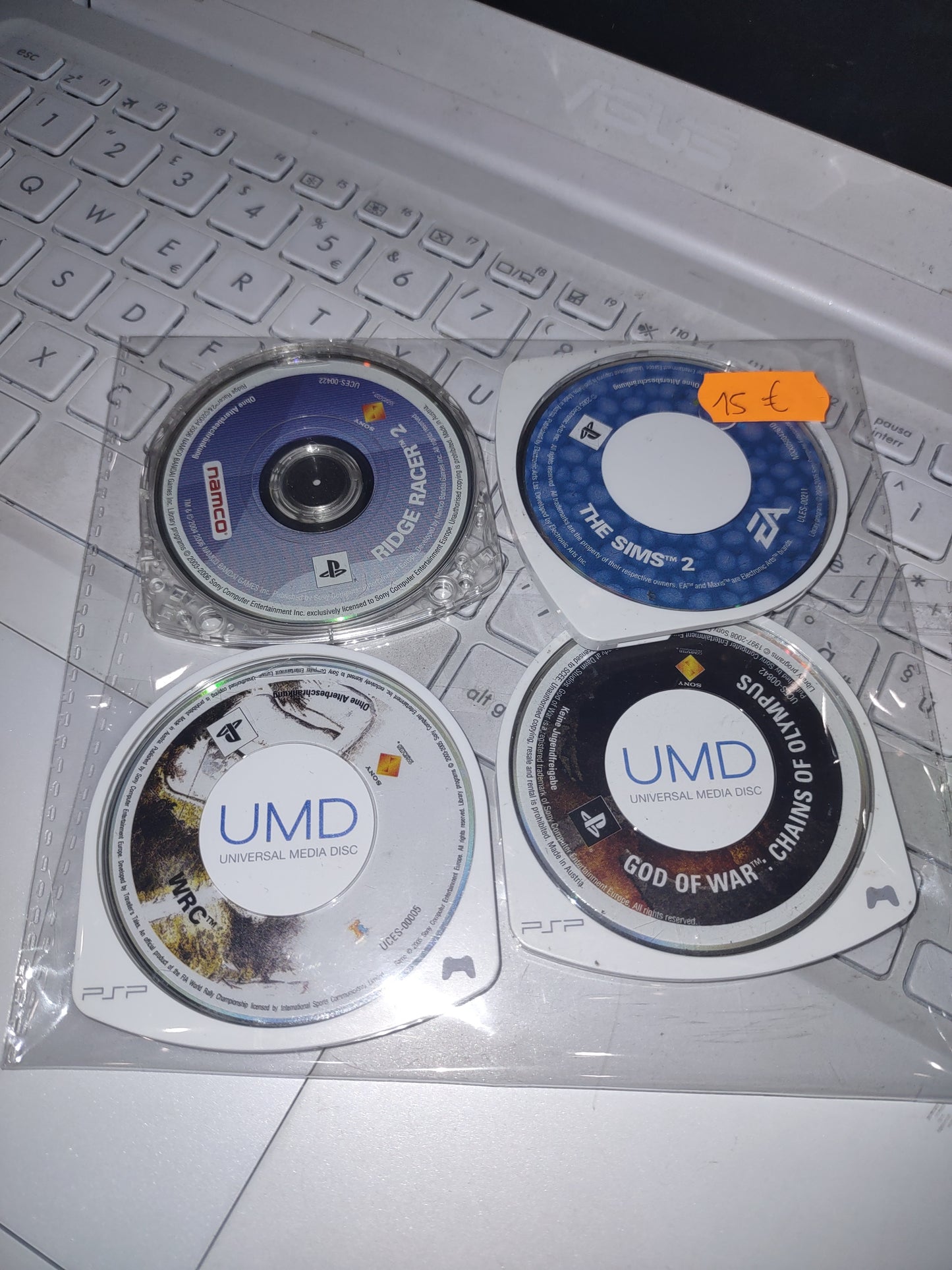 Lotto 4 giochi loose PlayStation PSP God of war Ridge Racer WRC the Sims Sony