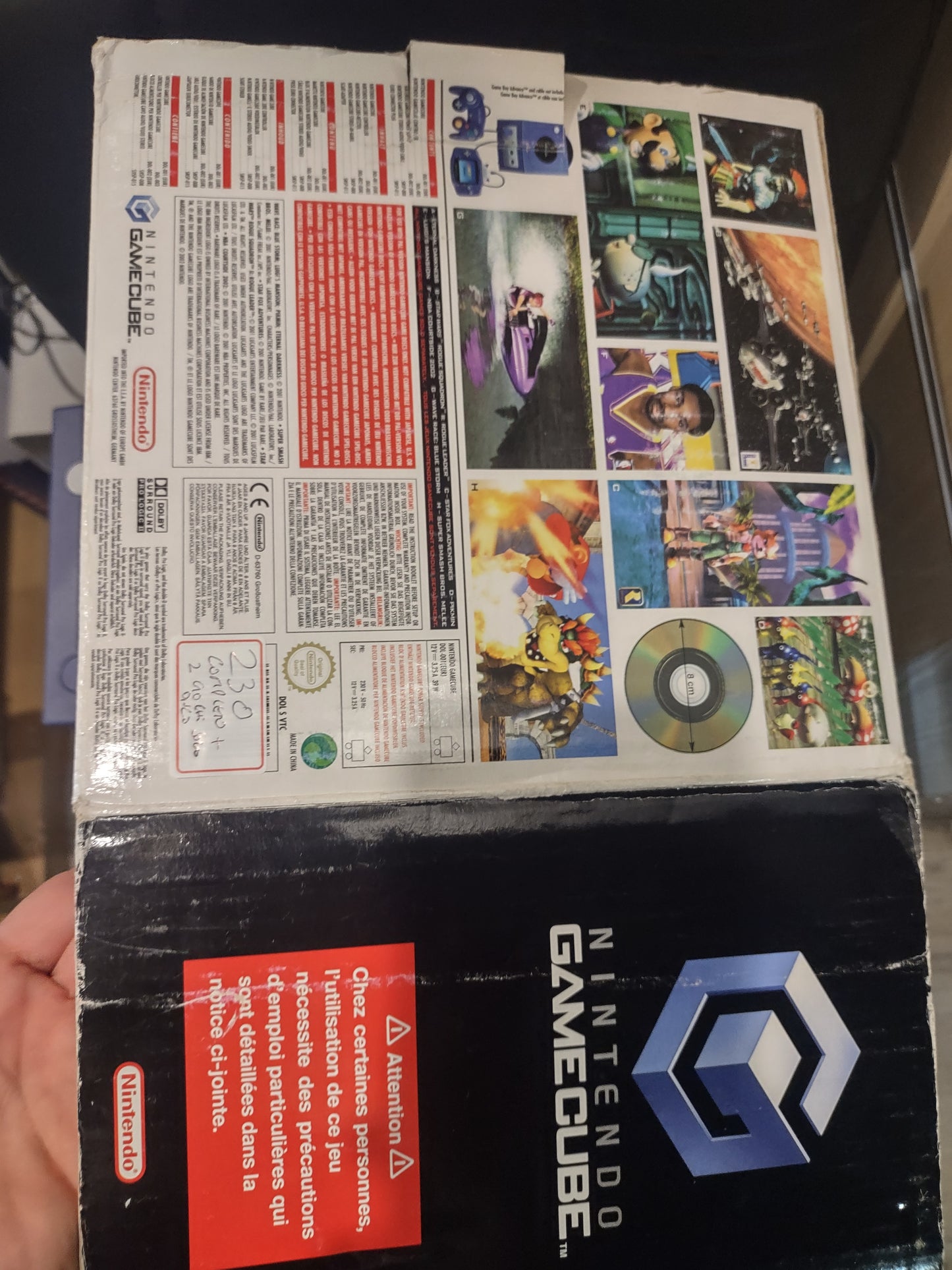 Console Nintendo GameCube con scatola giochi Viola